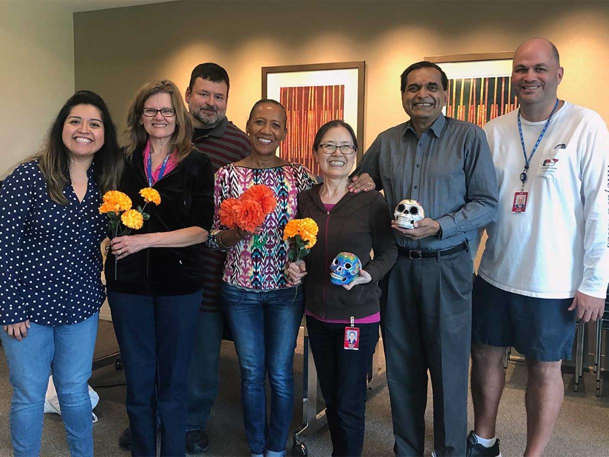 Coworkers smiling at company event